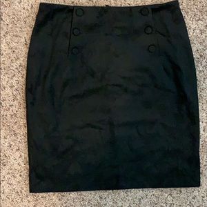 Knee length black faux suede skirt